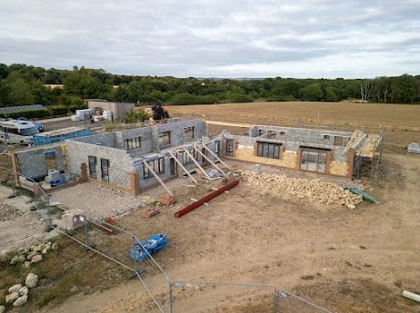 The front elevation taking shape with door and window openings